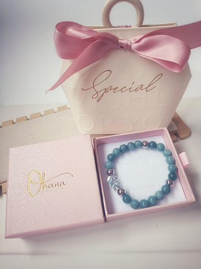 Pulsera de Cuarzo Azul:  PAZ