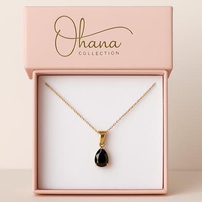 Colgante Gota Negra con Cadena Dorada – Elegancia Atemporal